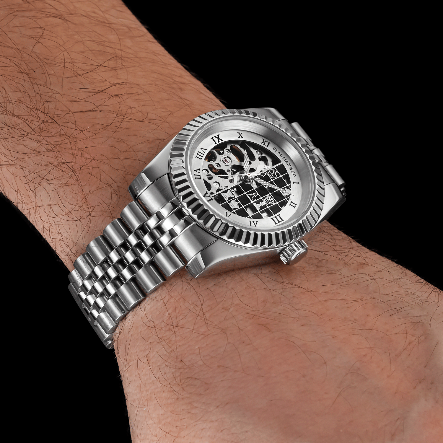 Chess-themed wristwatch with detailed face on a wrist against a black background