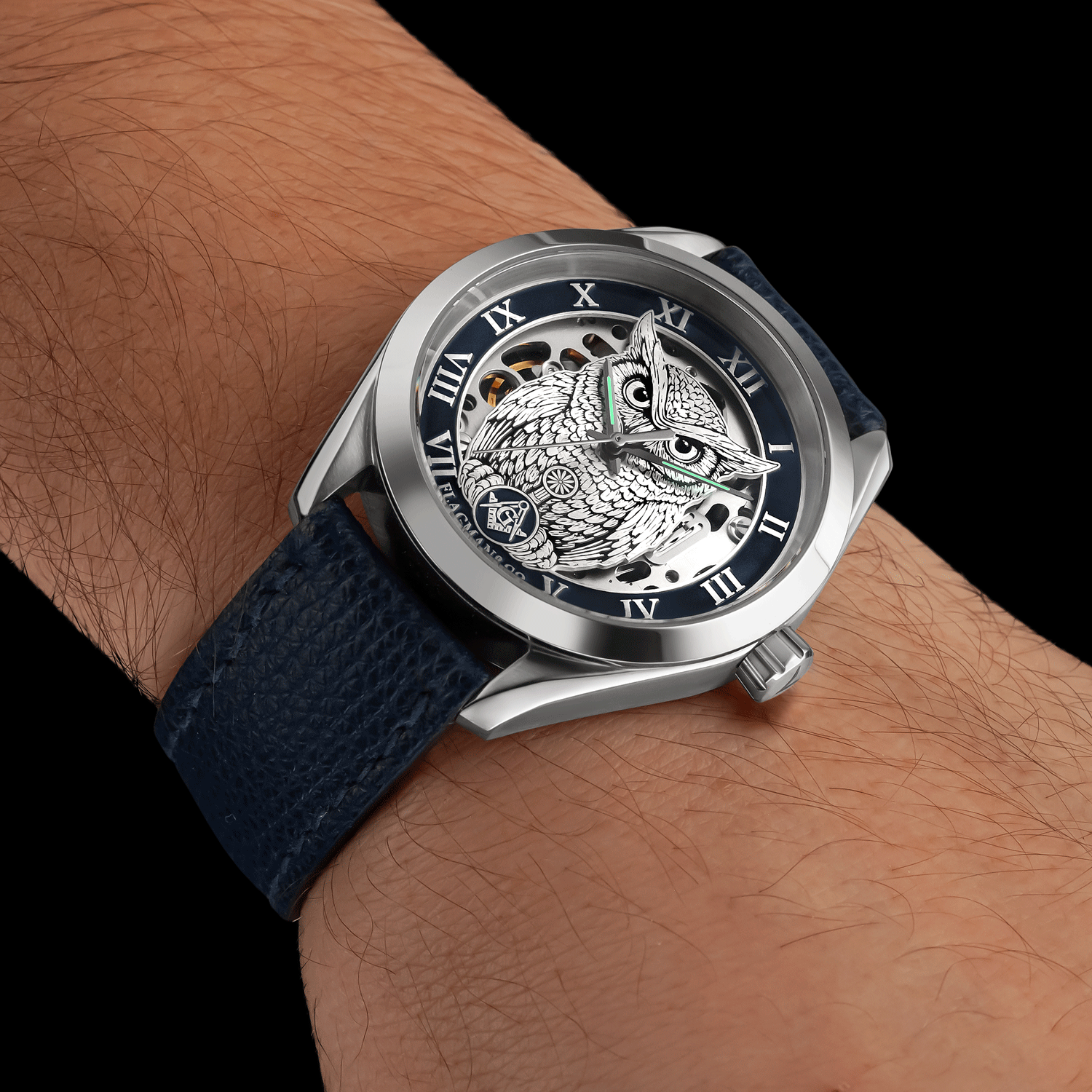 Front view of skeleton masonic watch - Noctua Blue, worn on mens wrist