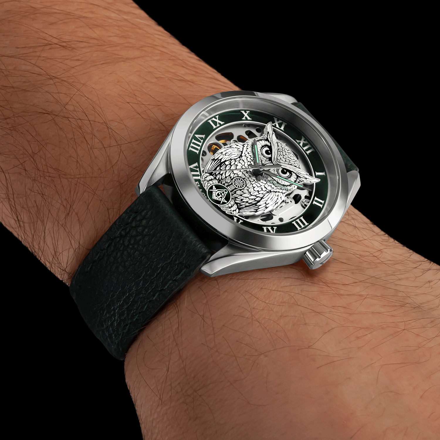 Front view of skeleton masonic watch - Noctua green, worn on mens wrist
