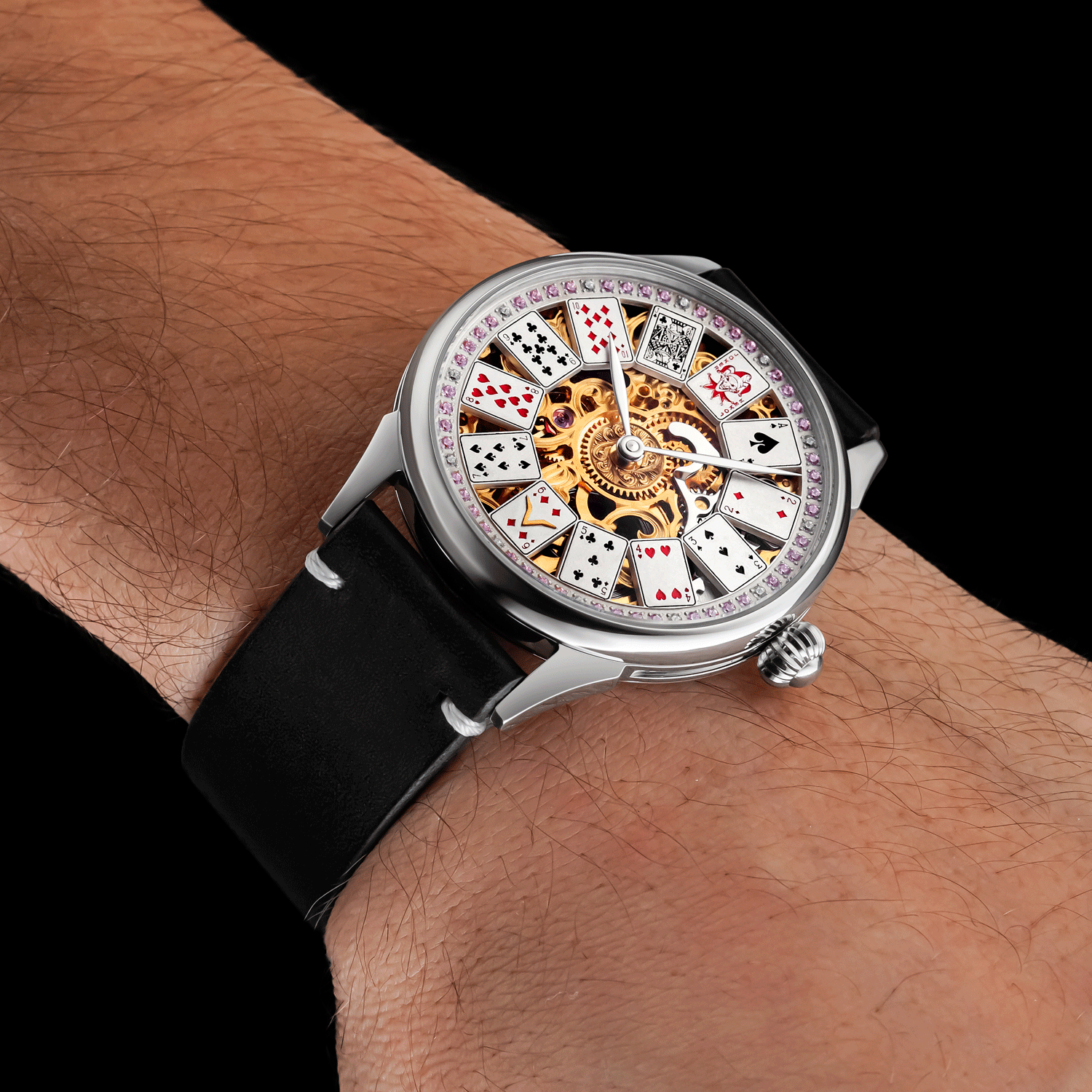 Front view of luxury skeleton watch worn on wrist – poker-inspired design