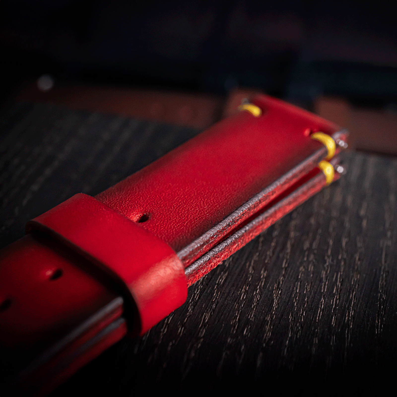 Close up view of Italian Pueblo leather Handmade watch strap, color Red - lifestyle photo