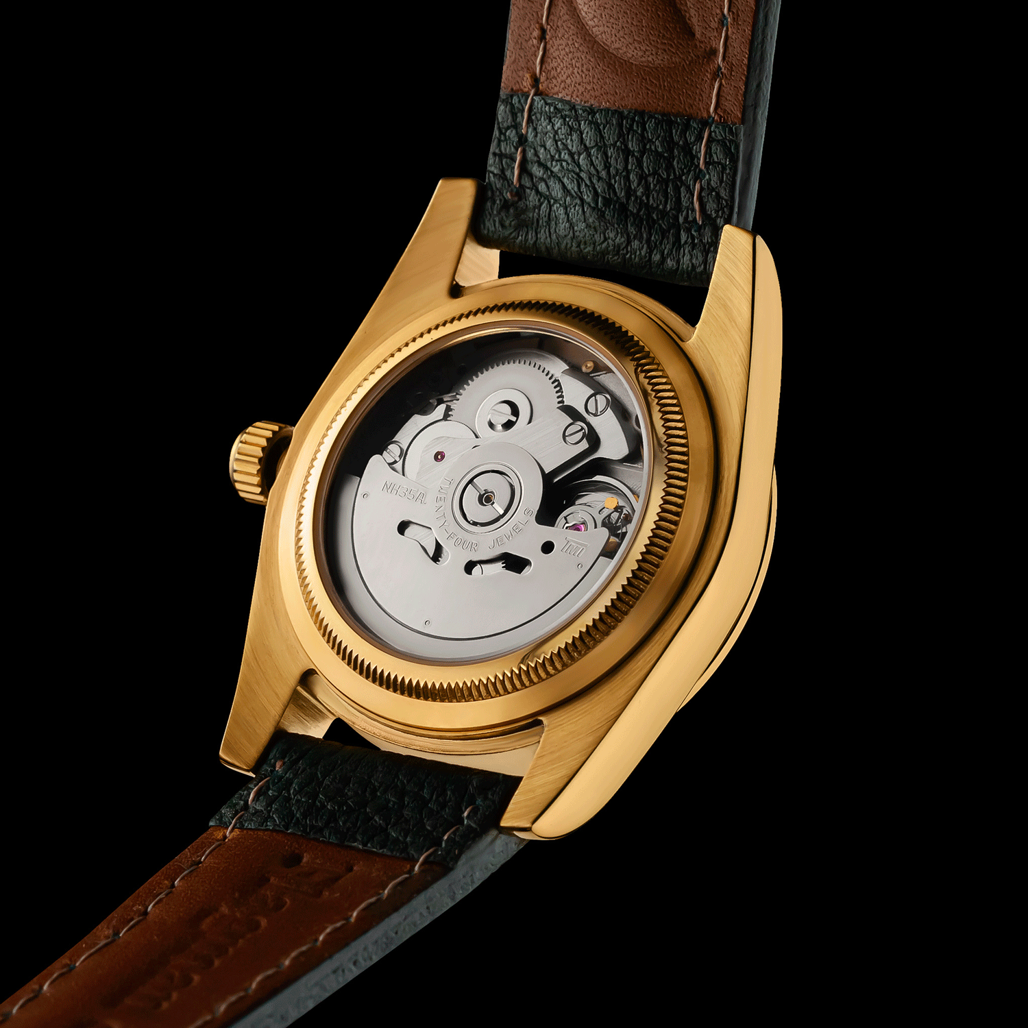 Womens watch with visible mechanical components on a black background