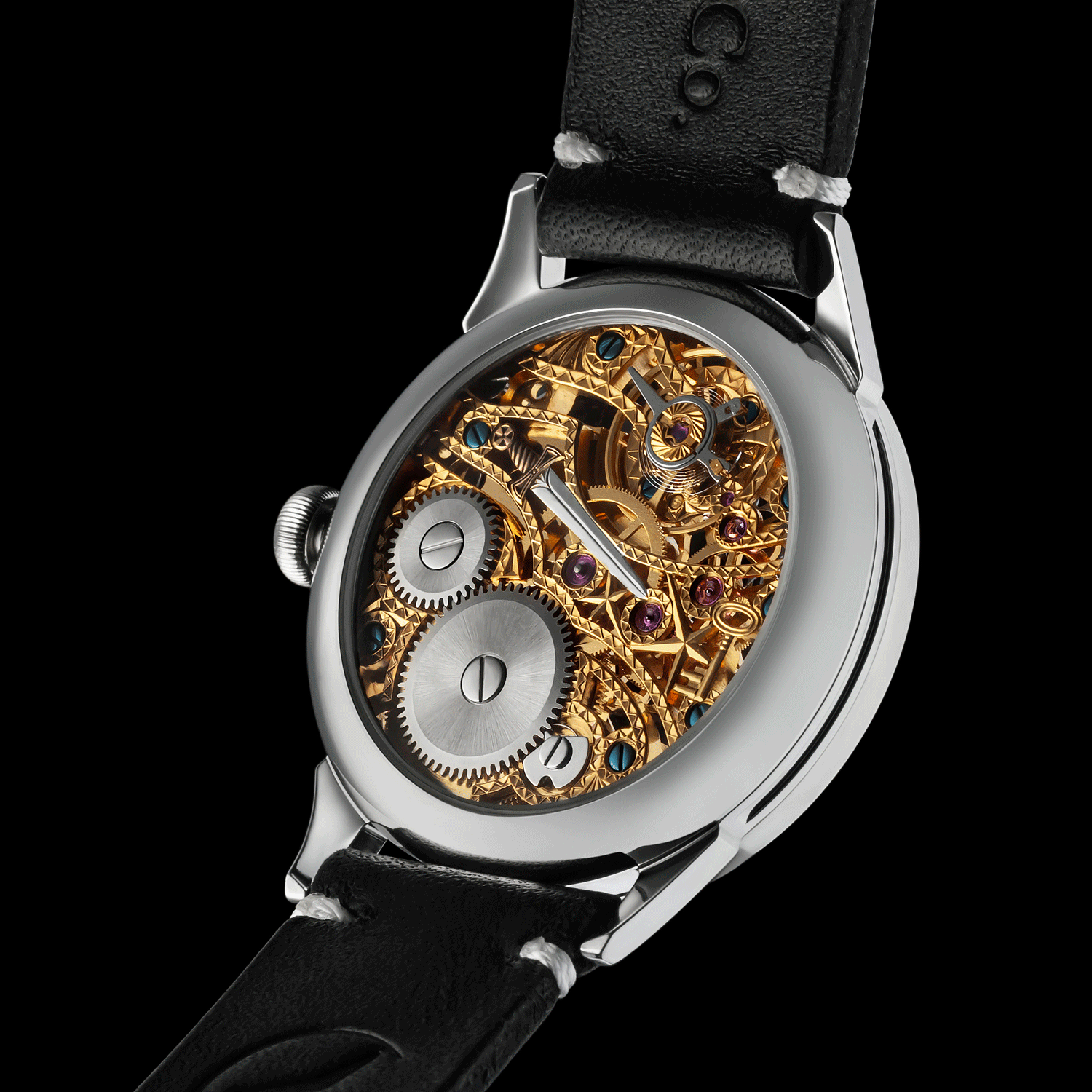 Skeleton watch with black leather strap and visible mechanical gears on a white background