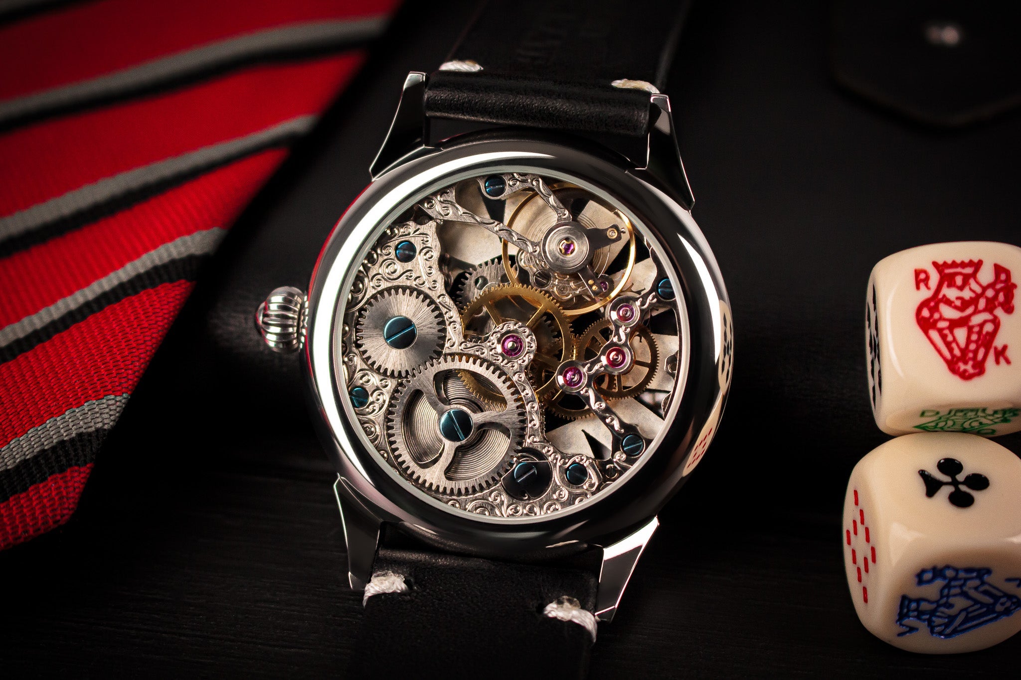 Rear view of Card Table 1.0 showing skeleton caseback and manual winding movement