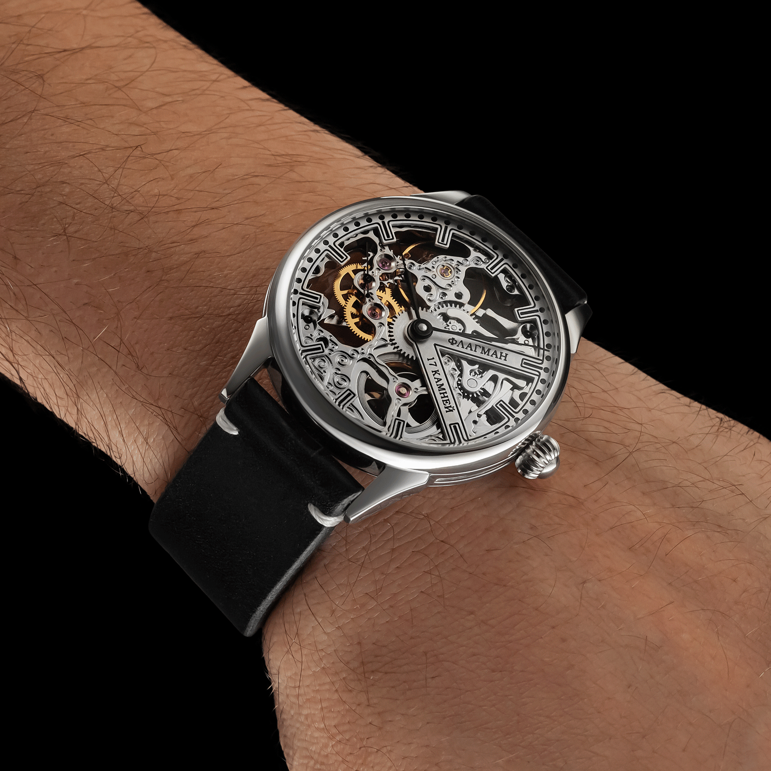 Front view of skeleton watch worn on wrist