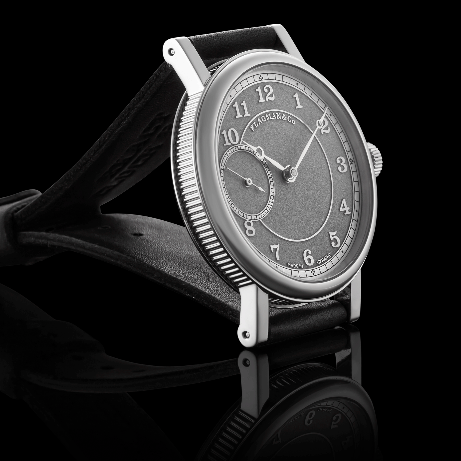 Bohemia watch with black strap on a reflective surface
