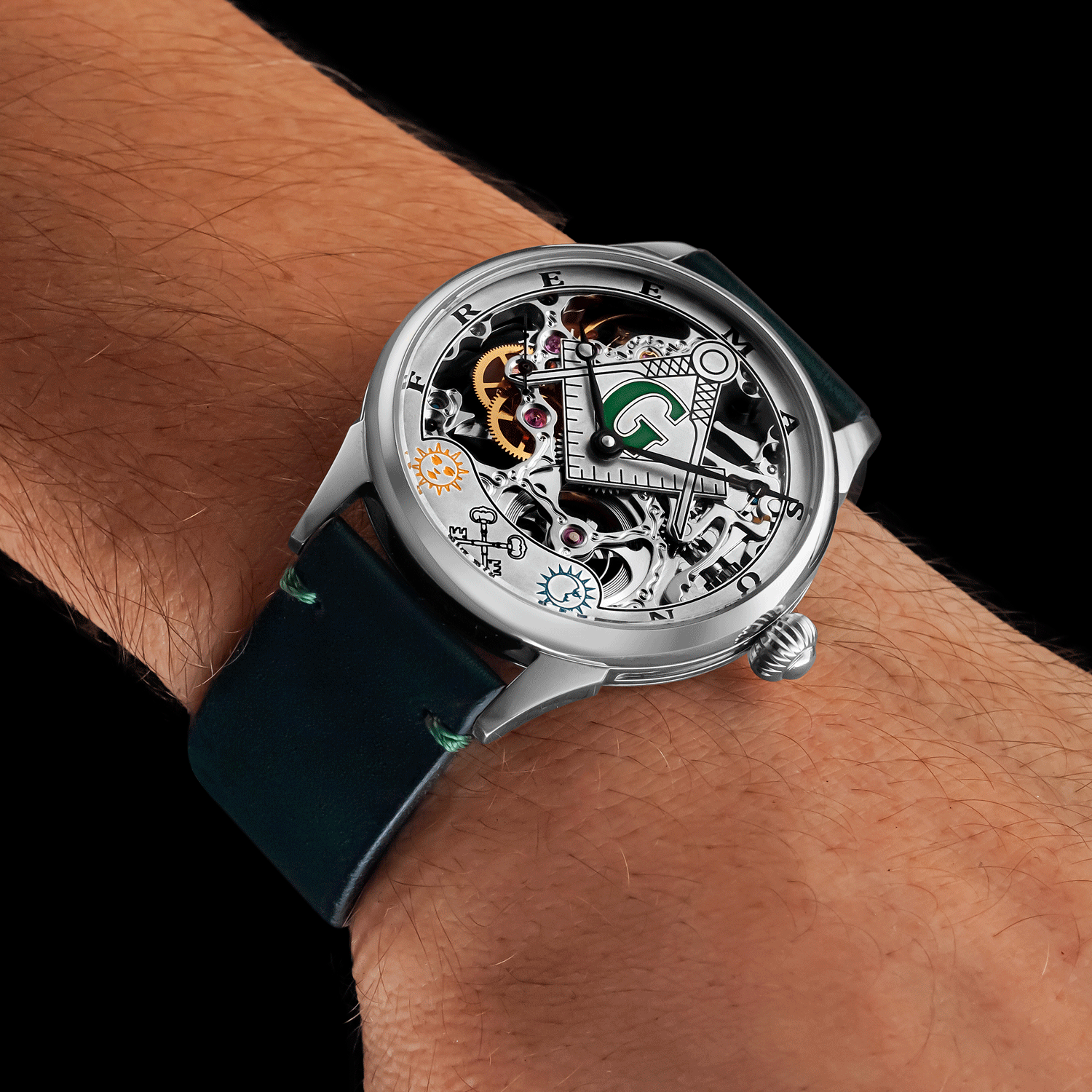 Front view of skeleton masonic watch worn on wrist