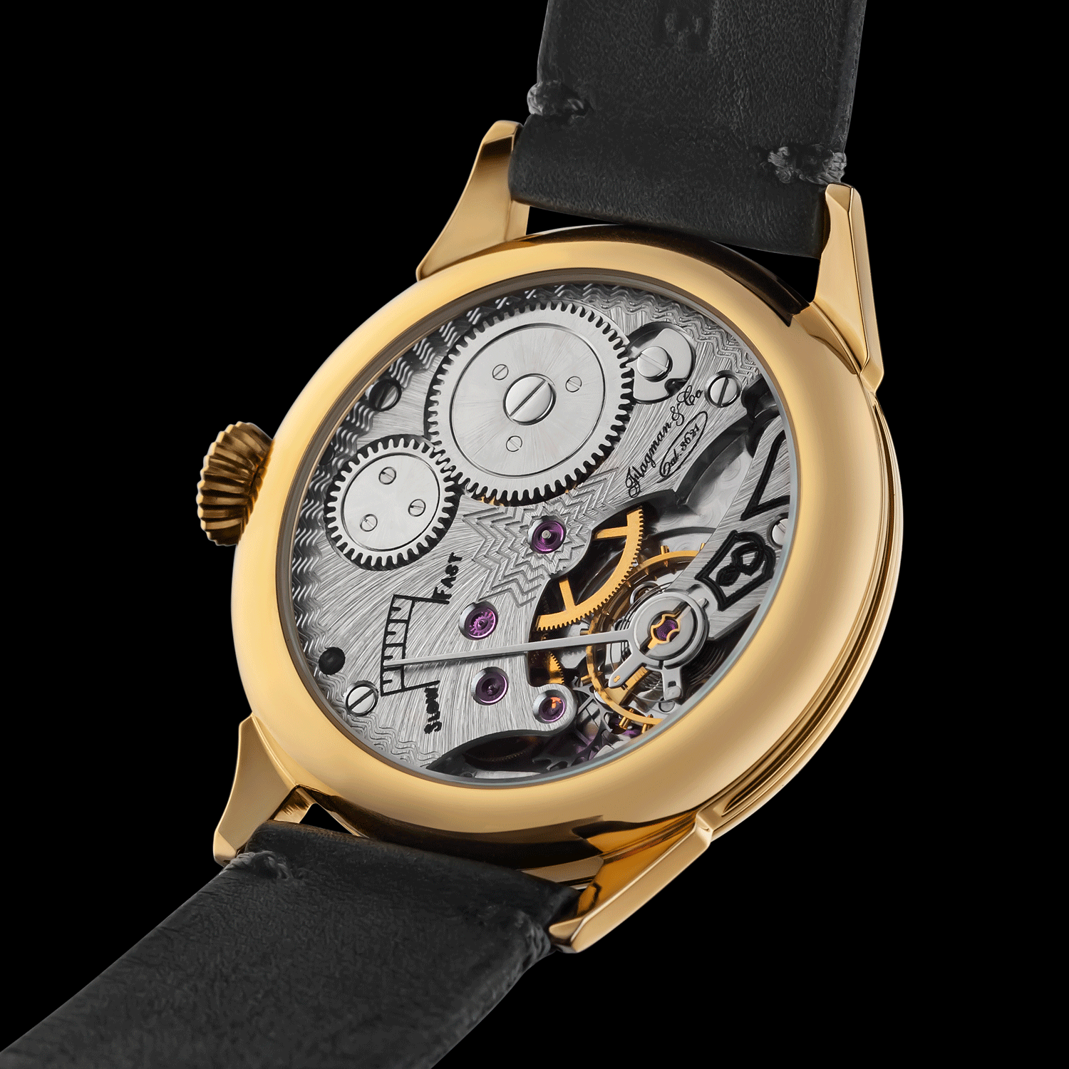 Rear view of Mens watch showing open caseback and movement