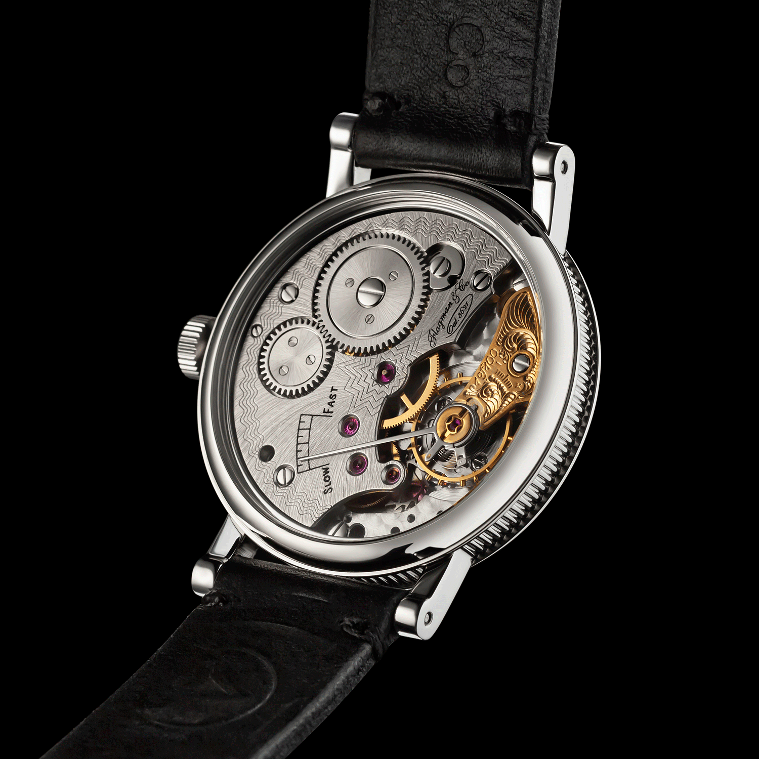 Close-up of a mechanical watch with visible gears and components on a black background