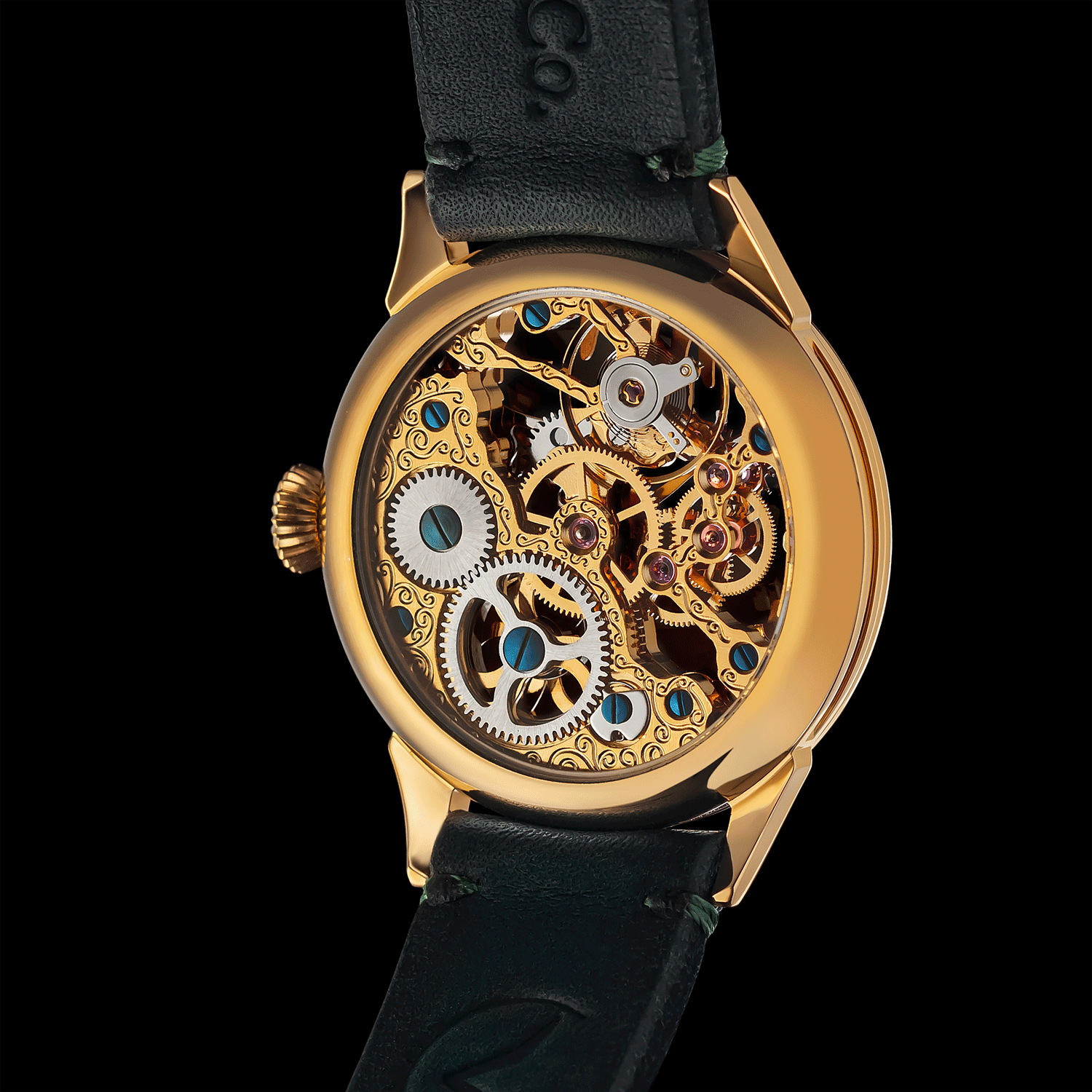 Rear view of skeleton mechanical watch showing open caseback and movement. - Arabic Emerald