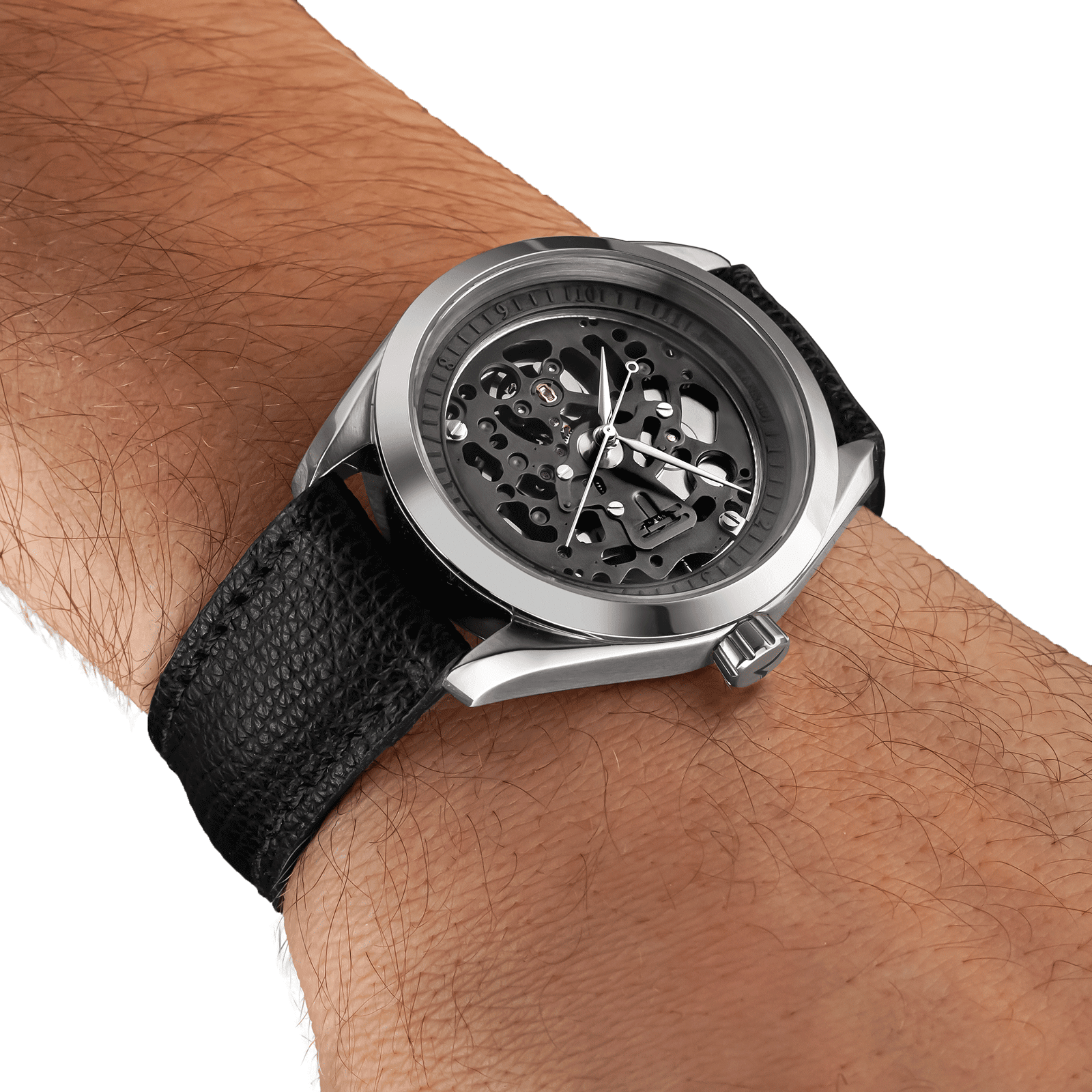 Steampunk wristwatch with a detailed face on a wrist against a white background