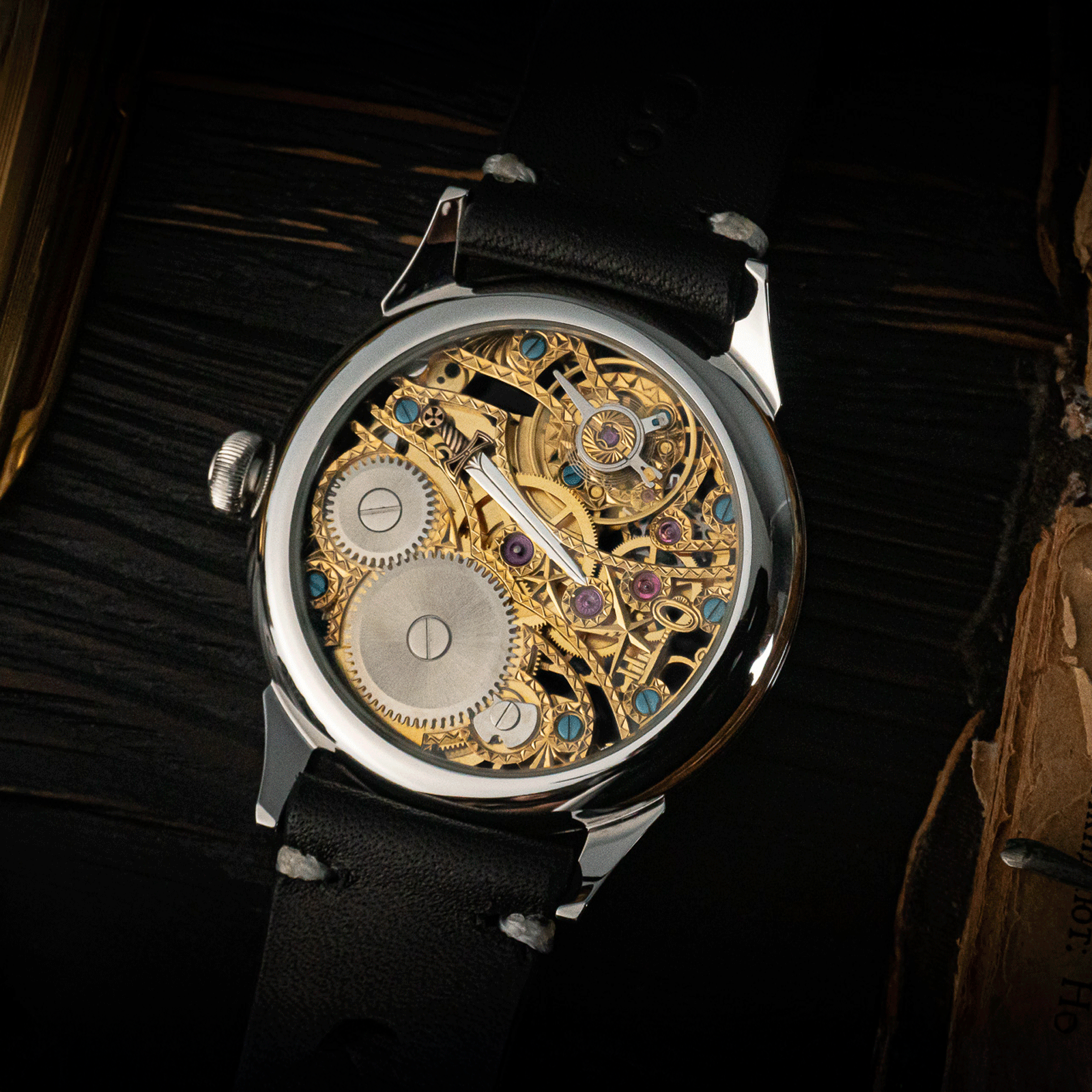 Skeleton watch with intricate mechanical design on a dark background