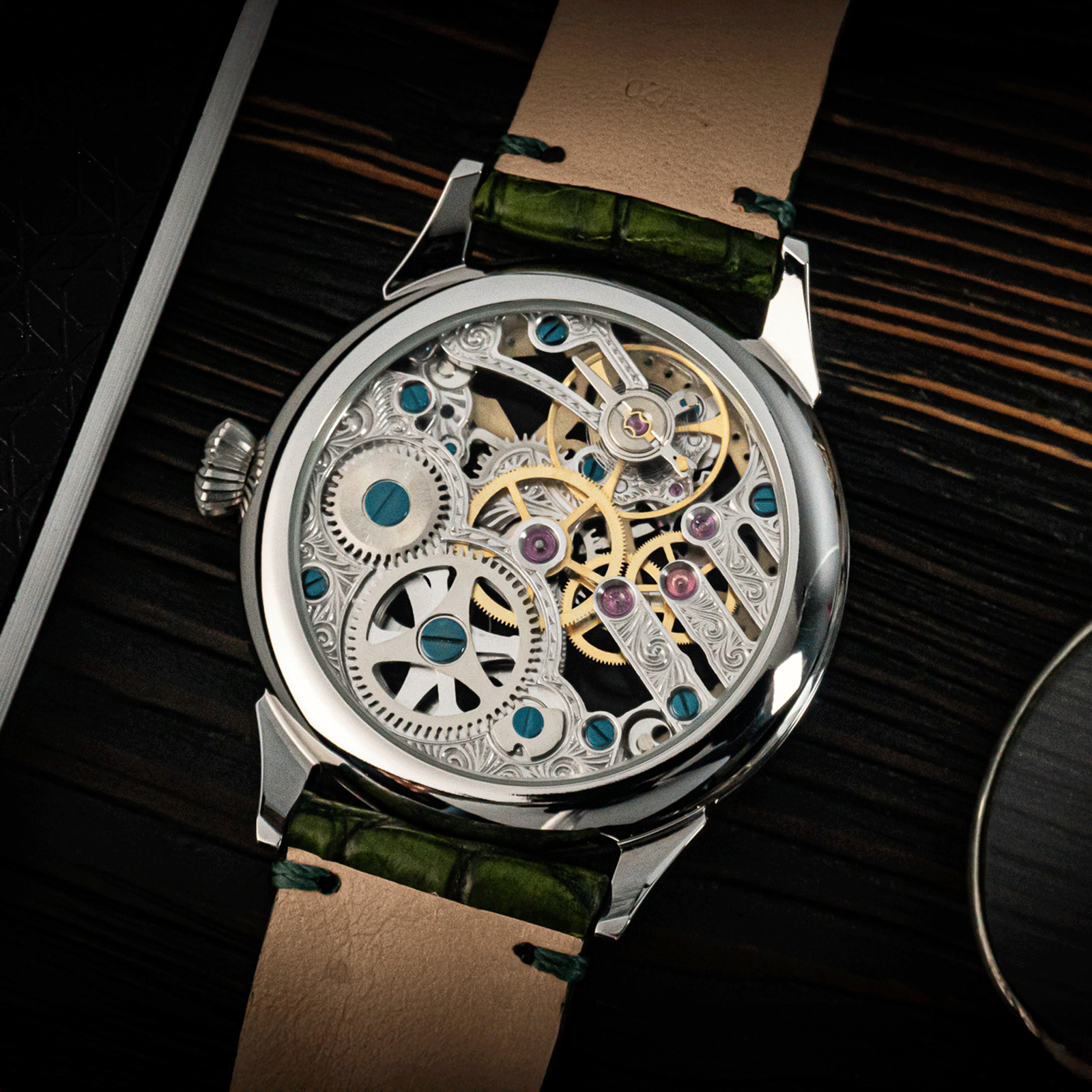 Rear view of masonic Mystery Emerald showing skeleton caseback and manual winding movement