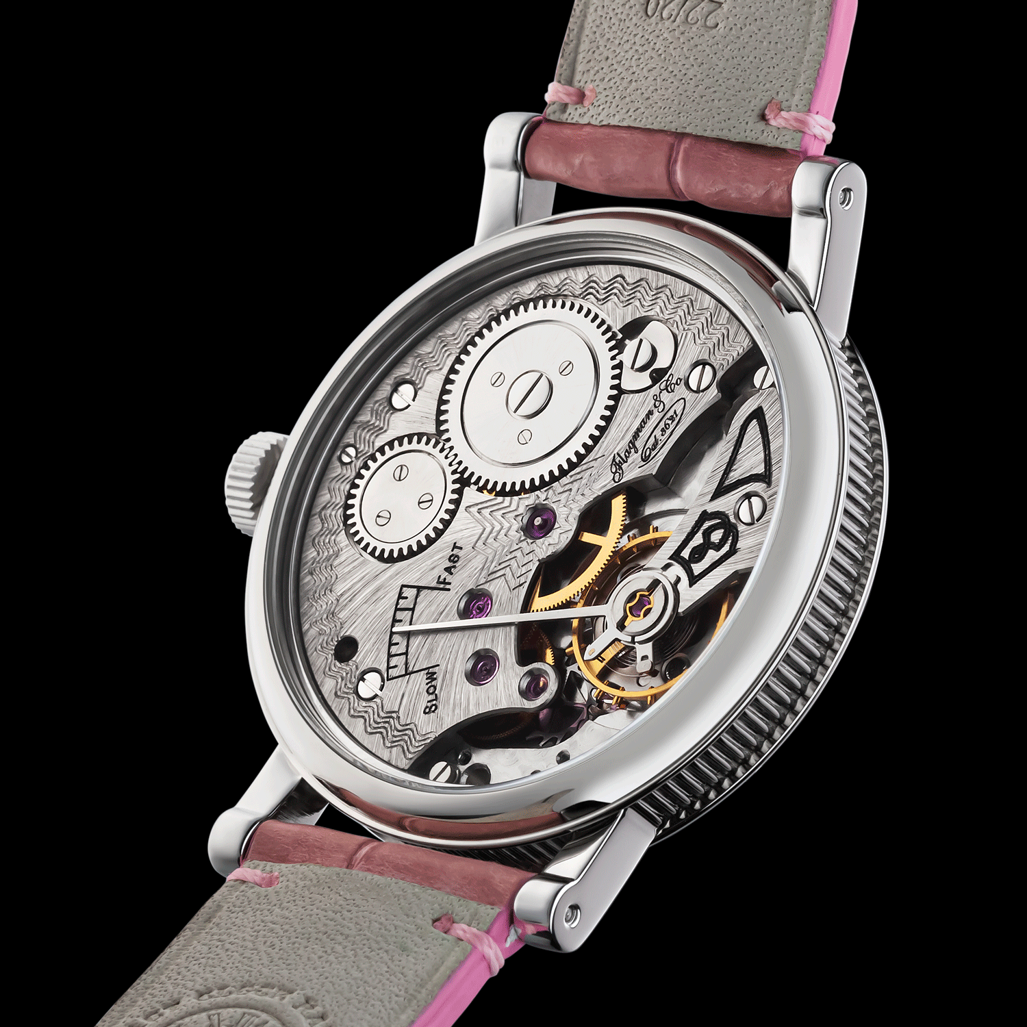 Watch with pink strap and visible mechanical components on a black background