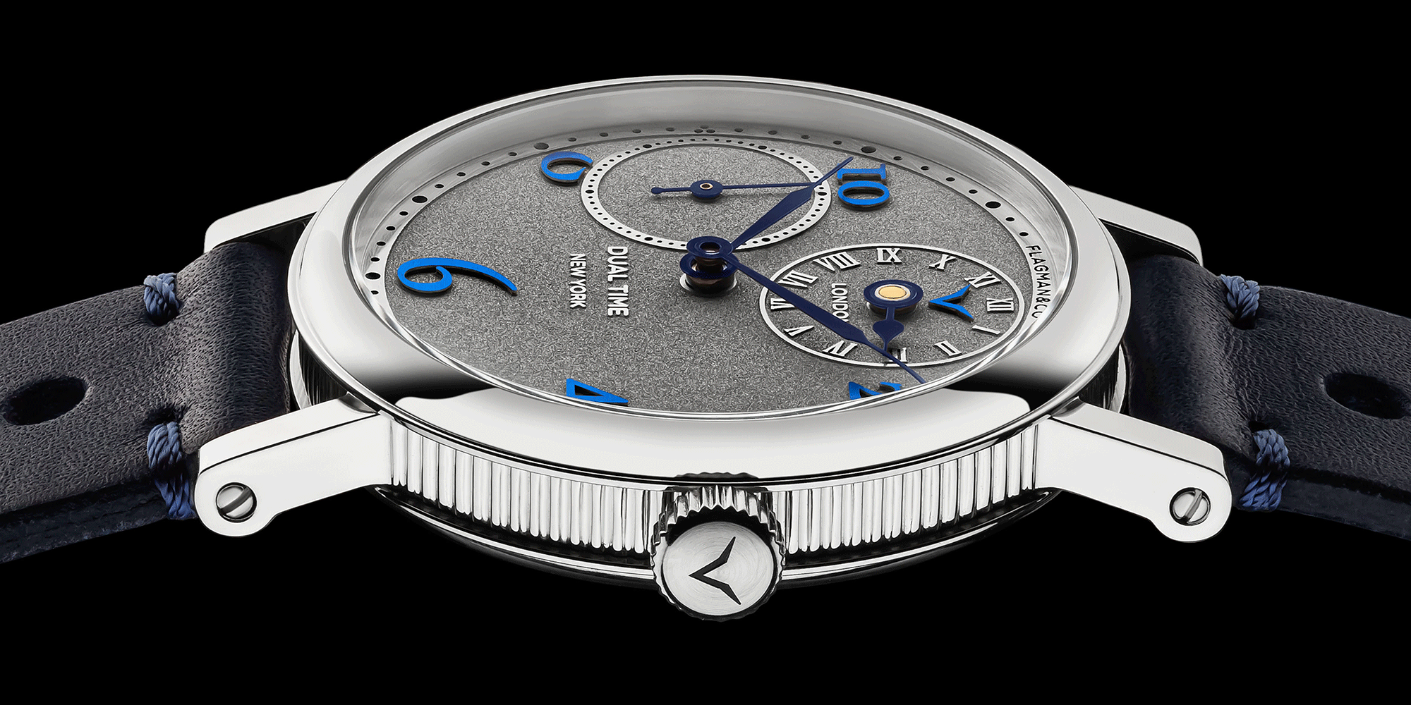 Close-up view of handmade mechanical watch Regulator Blue crown