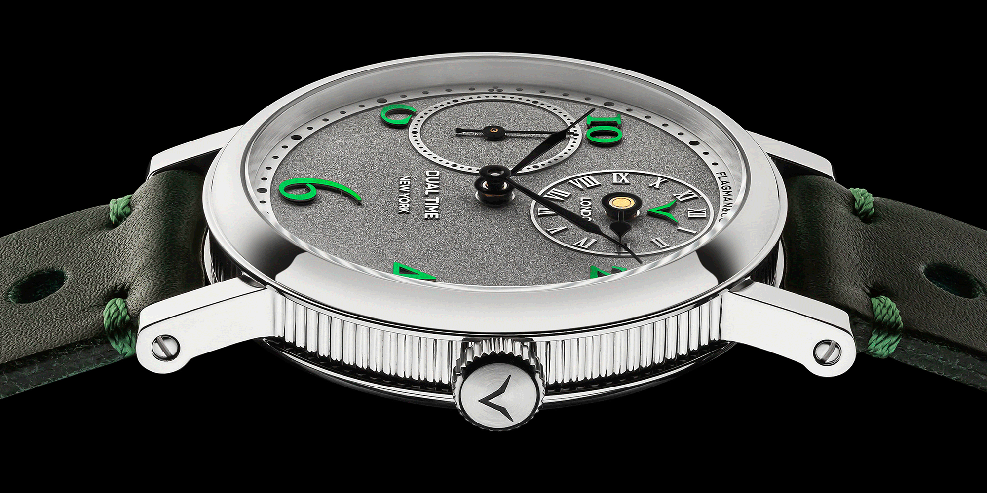 Close-up view of handmade mechanical watch Regulator Green crown