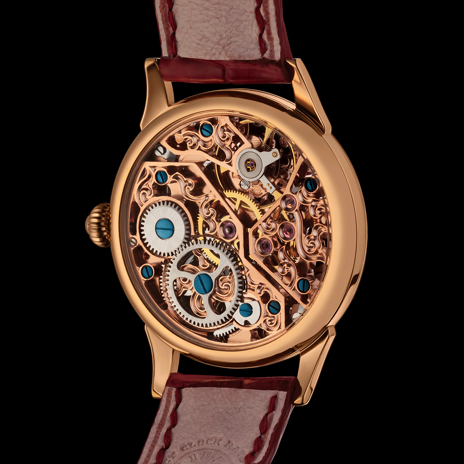 Rear view of skeleton mechanical watch showing open caseback and movement. - Lace