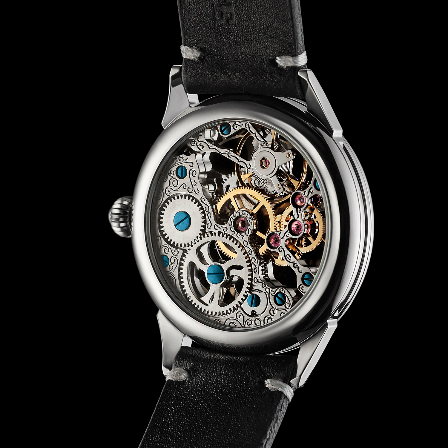 Rear view of skeleton watch showing open caseback and movement