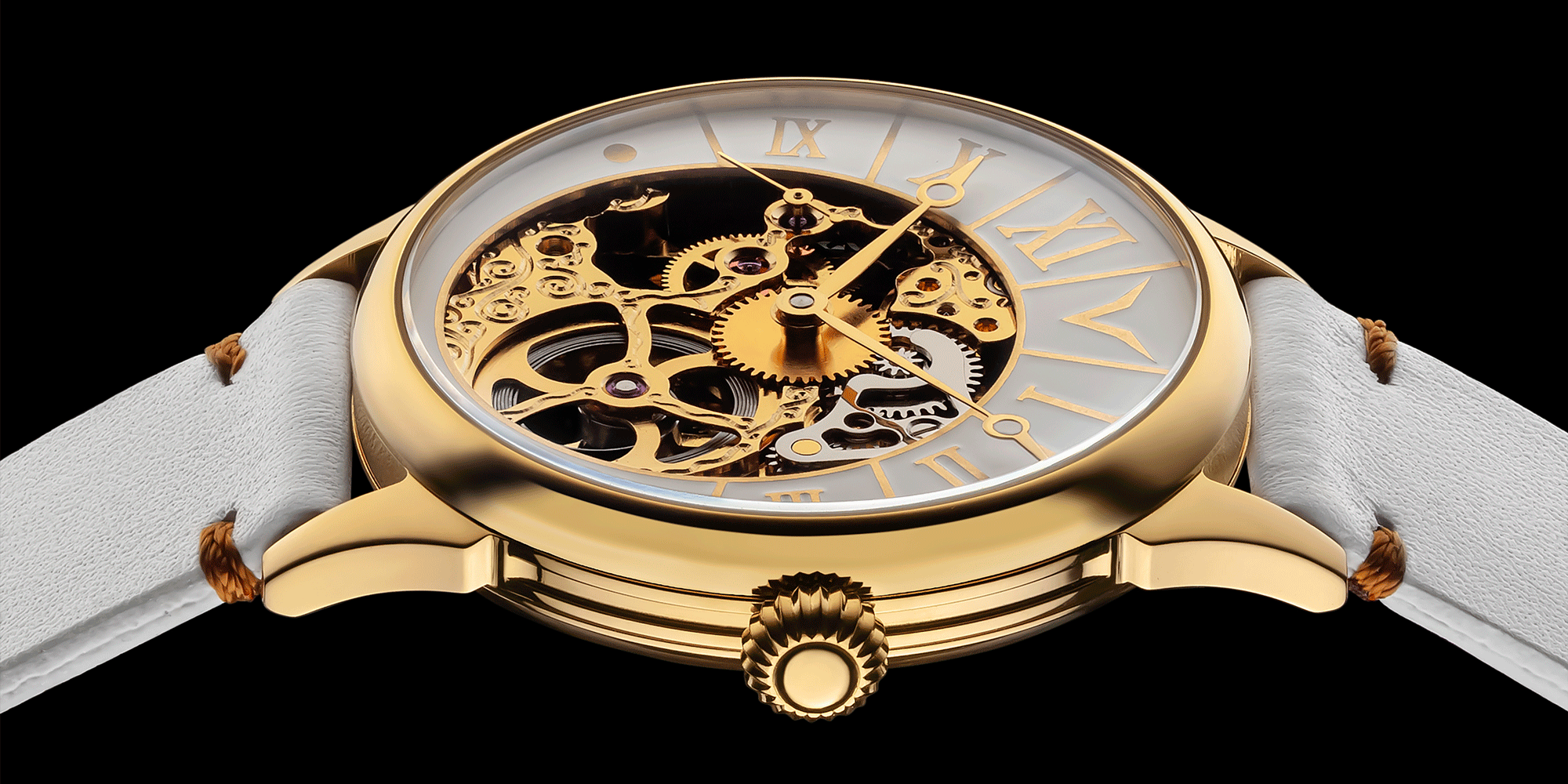 Close-up of unisex skeleton mechanical watch crown