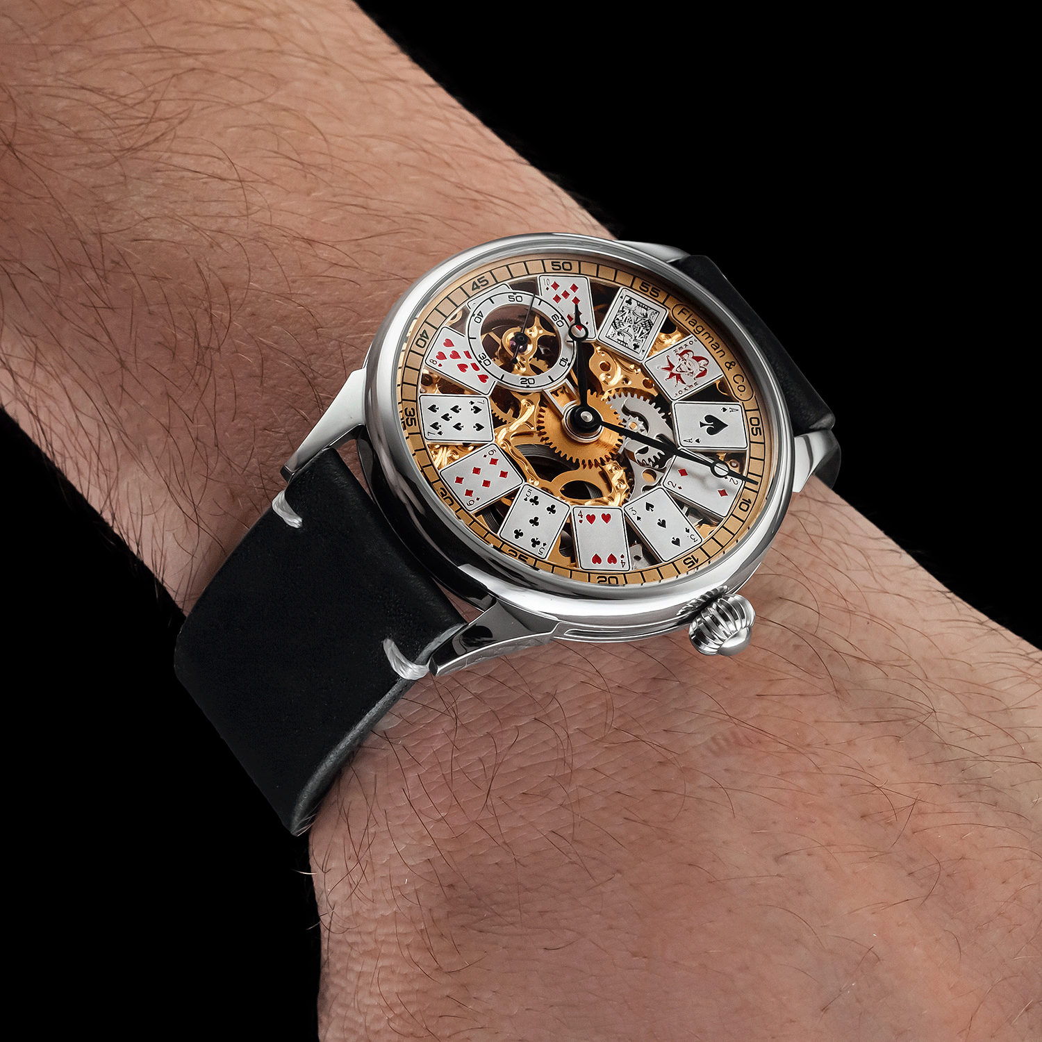 Front view of handmade skeleton watch worn on wrist – poker-inspired design