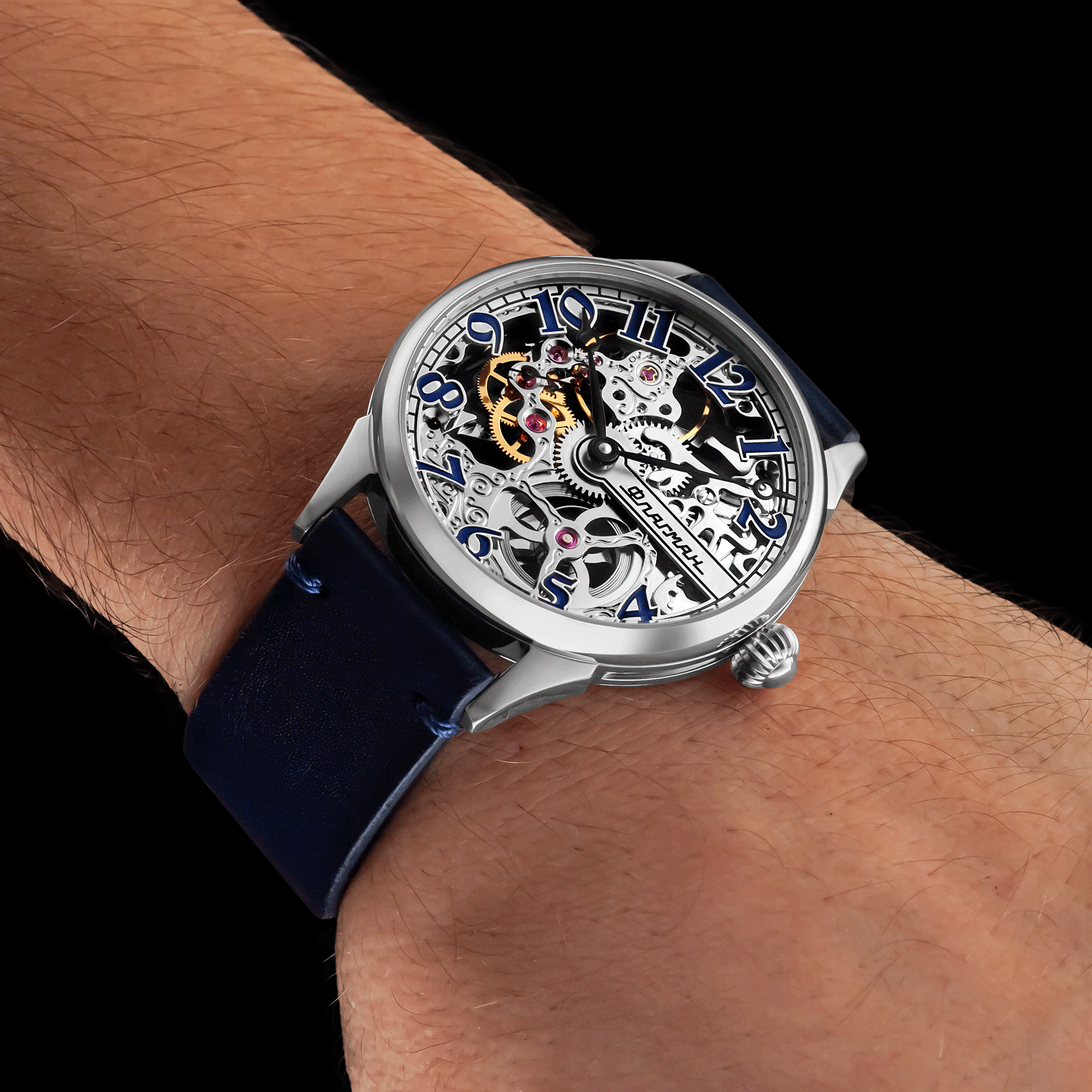 Front view of skeleton watch worn on wrist