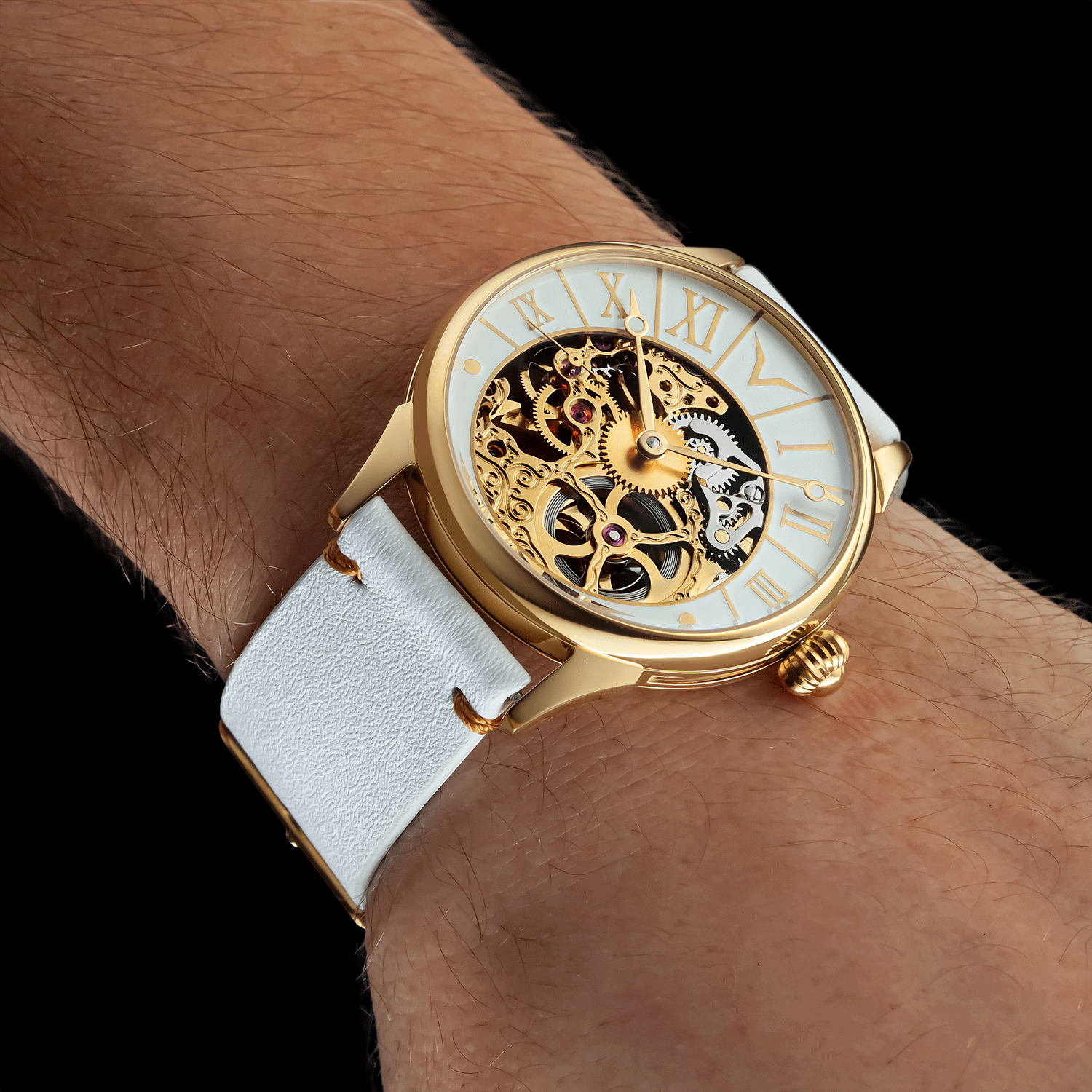 Skeleton wristwatch with white face and leather strap on a wrist against a black background