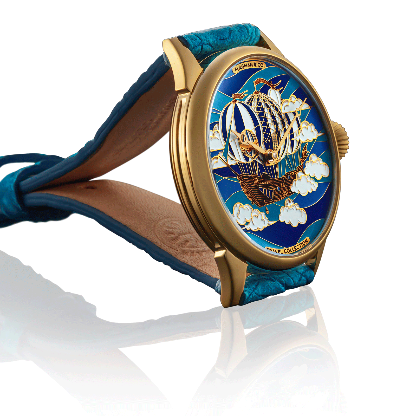 Luxury watch with blue strap and decorative face featuring hot air balloon design on a white background