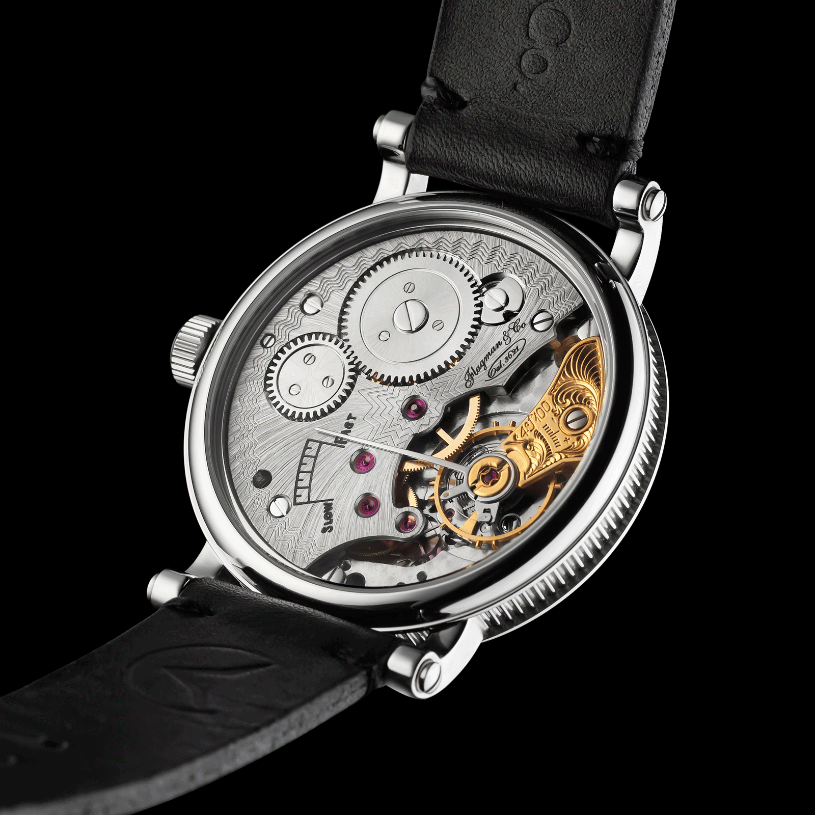 Rear View of artisan mechanical watch showing open caseback and movement - Adeptness