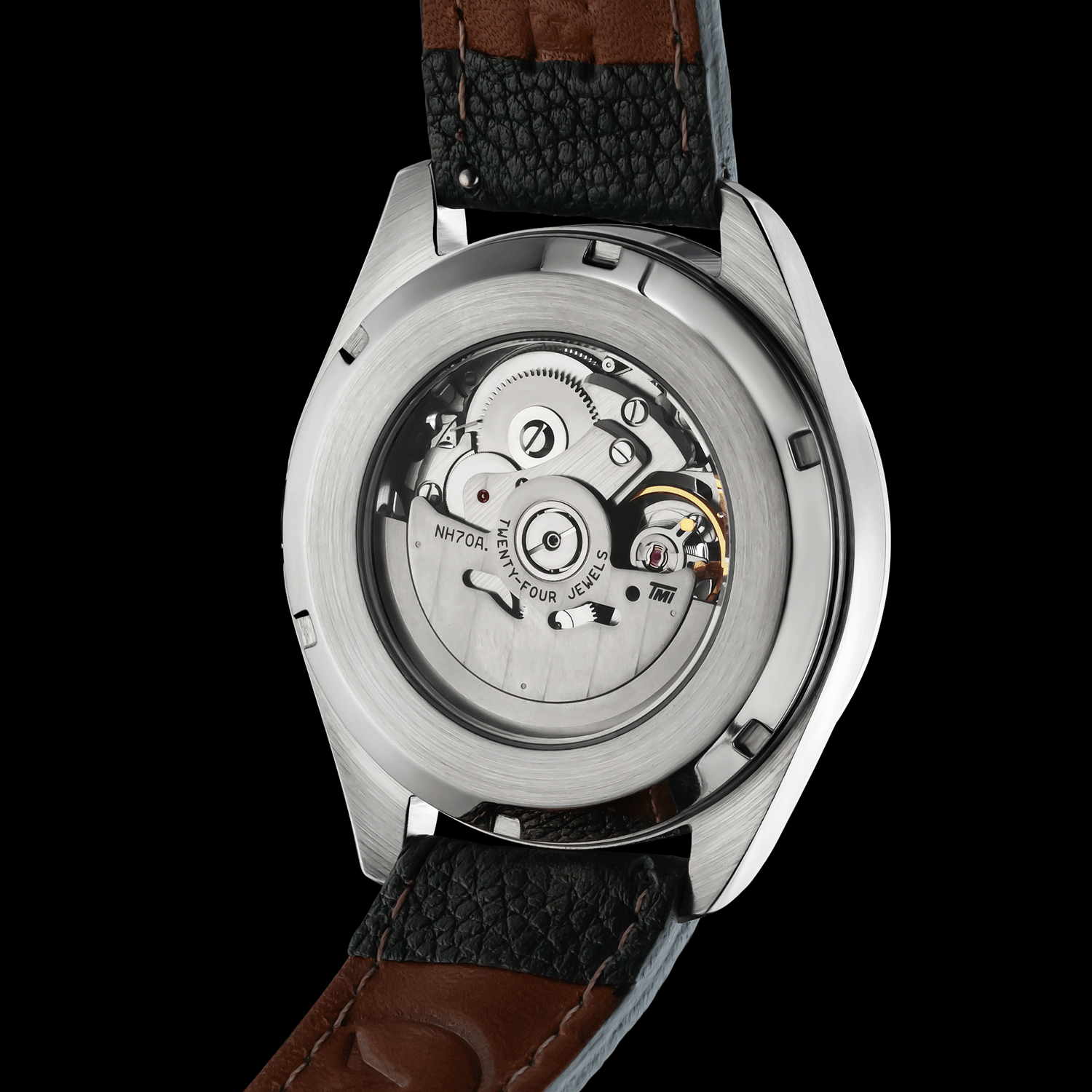 Rear view of freemason watch Noctua green - showing open caseback and movement
