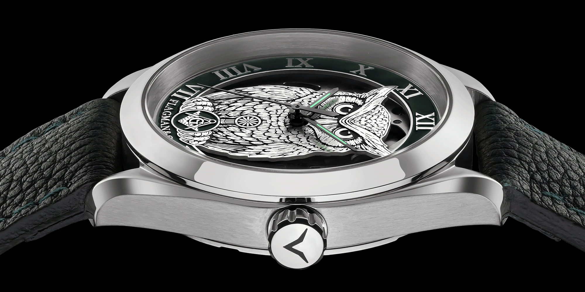 Close-up view of Masonic silver-plated handmade watch Noctua green, and its crown