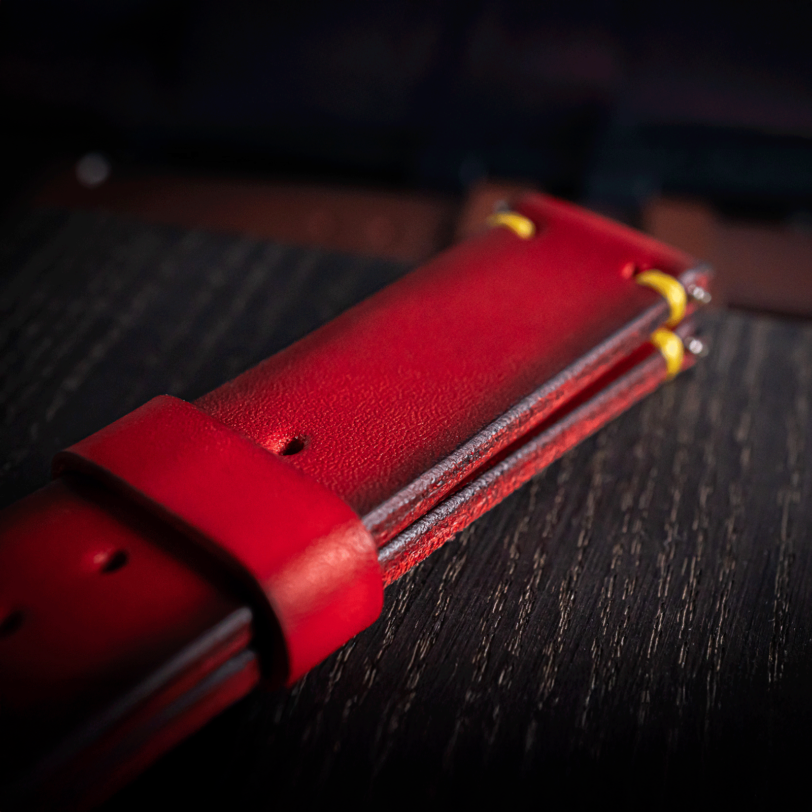Close up view of Italian Pueblo leather Handmade watch strap, color Red -  lifestyle photo