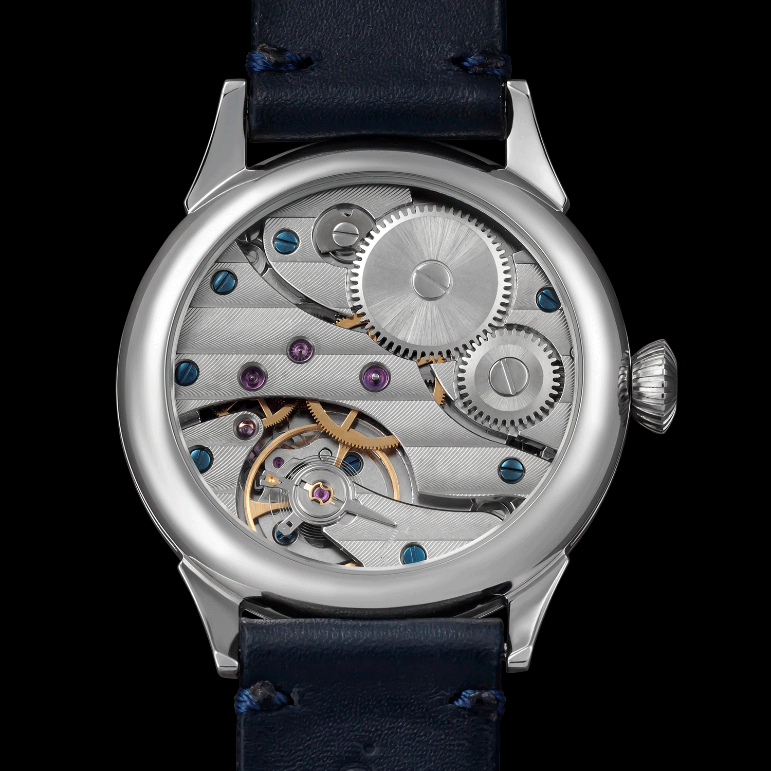 Rear view of handmade watch showing open caseback and movement - Spirit