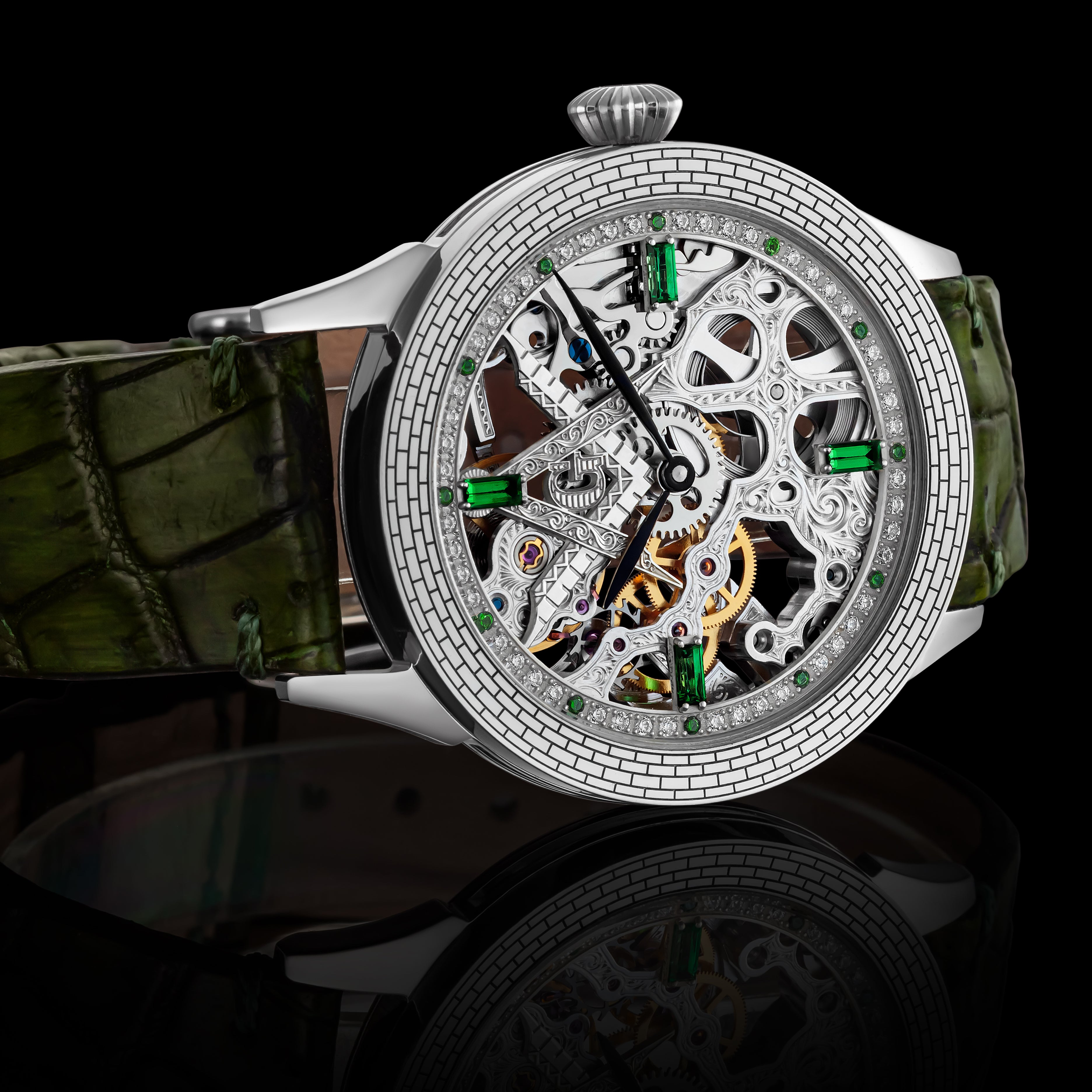 Luxury watch with intricate design and green strap on a reflective surface