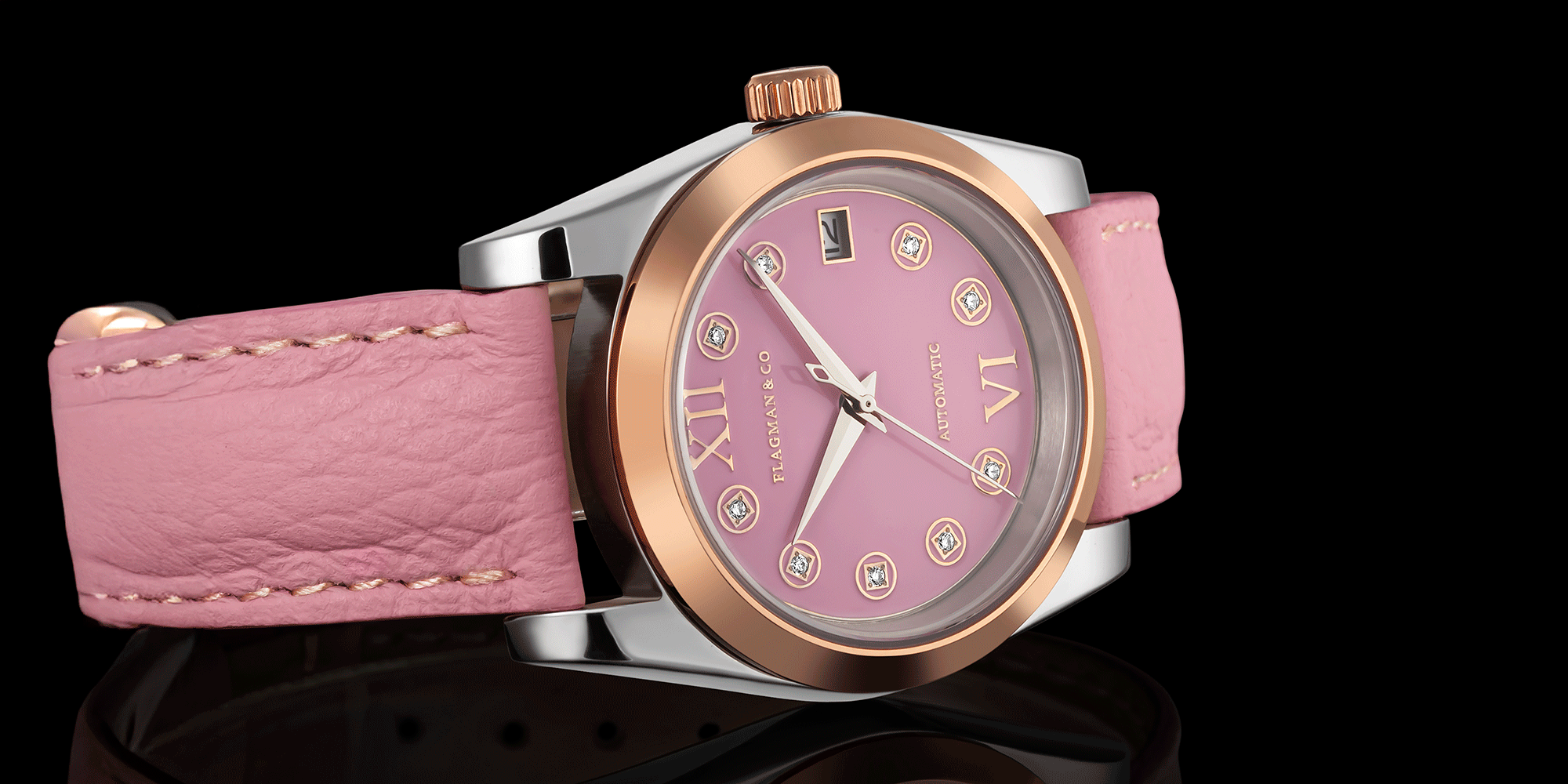 Close-up view of womens handmade mechanical watch, with crown - Lumine Pink