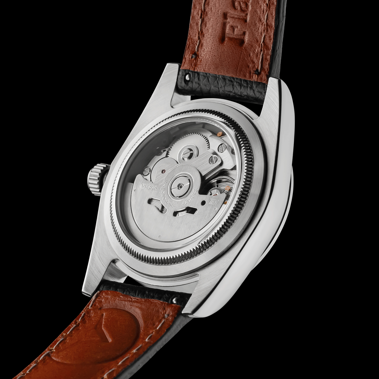 Watch with black leather strap and visible mechanical components on a black background