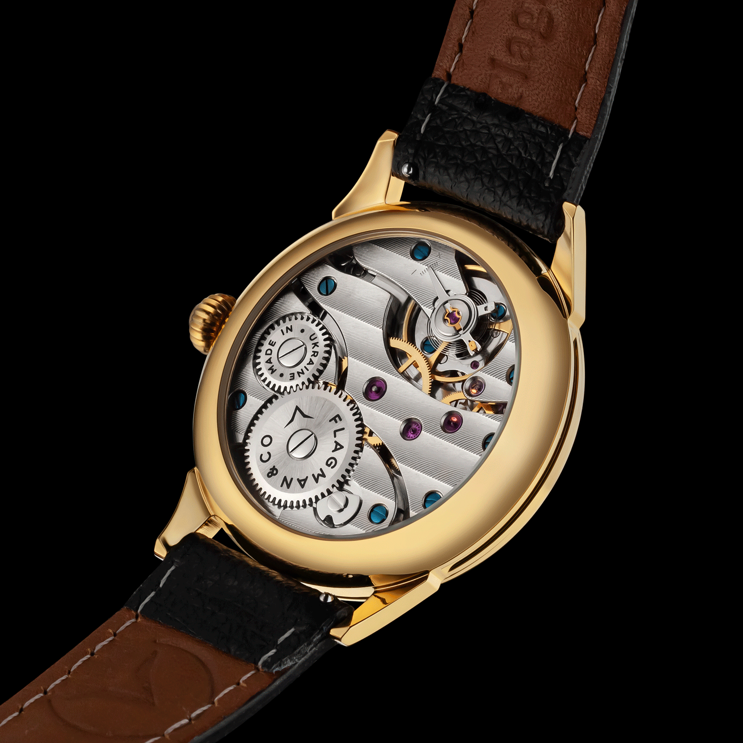 Artisan watch with visible mechanical components on a black background