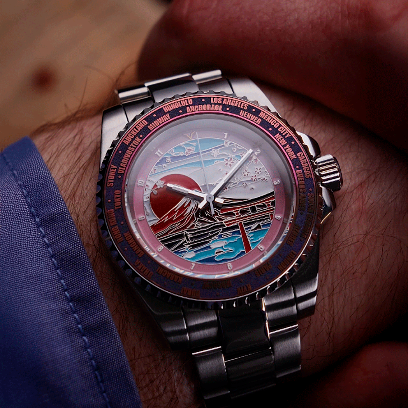 Close-up of a wrist wearing a detailed watch with a unique face.