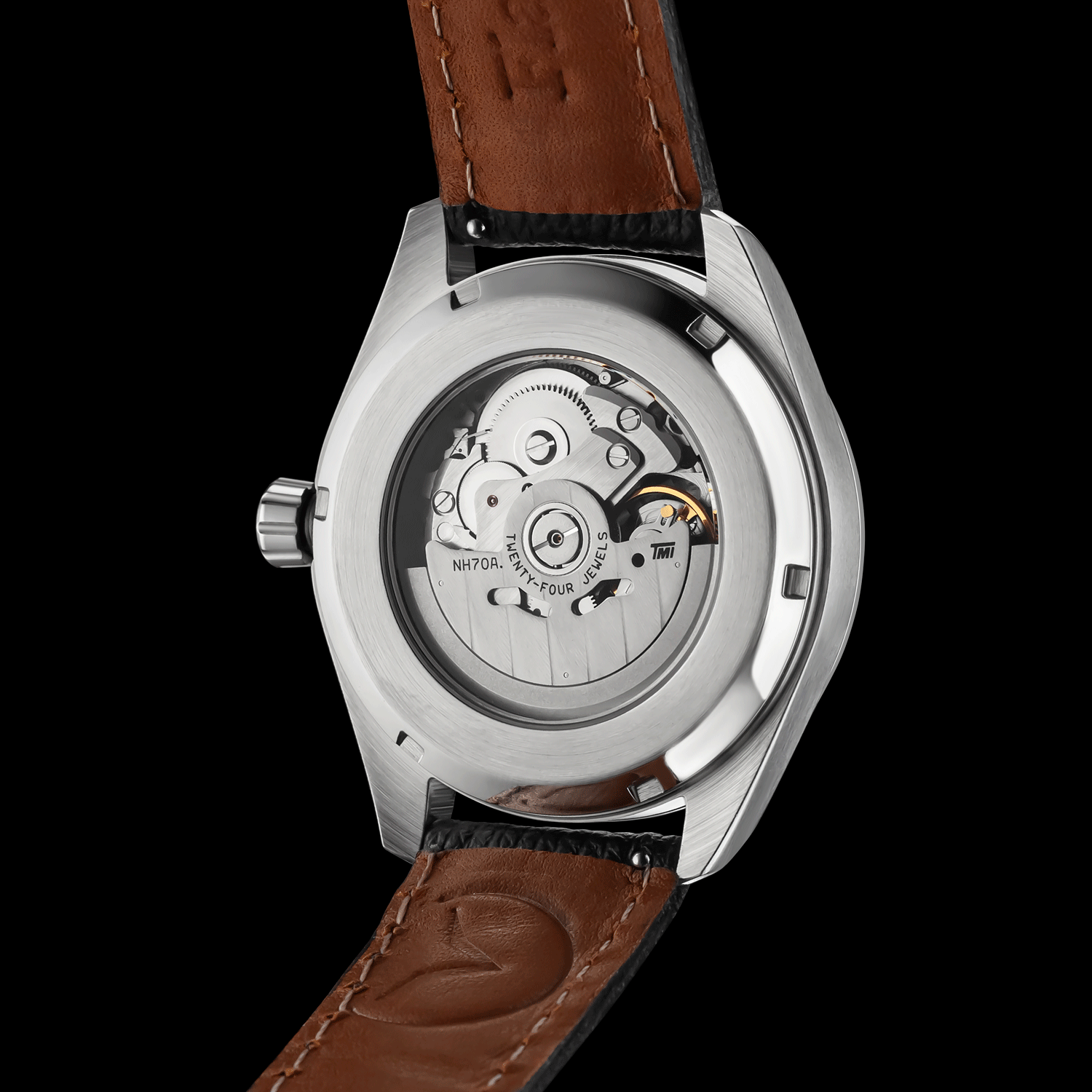 Watch with black leather strap and visible mechanical components on a black background