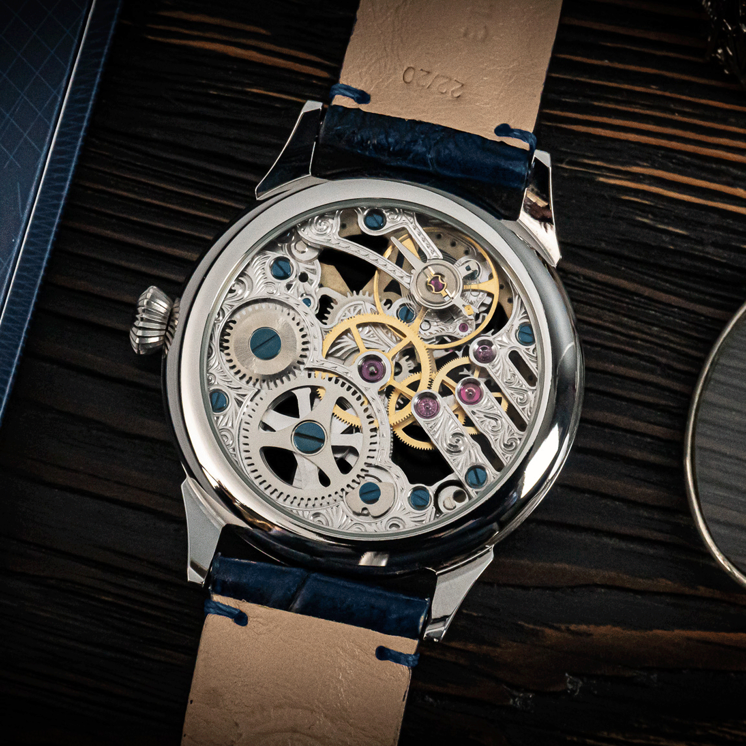 Rear view of masonic Mystery Blue showing skeleton caseback and manual winding movement