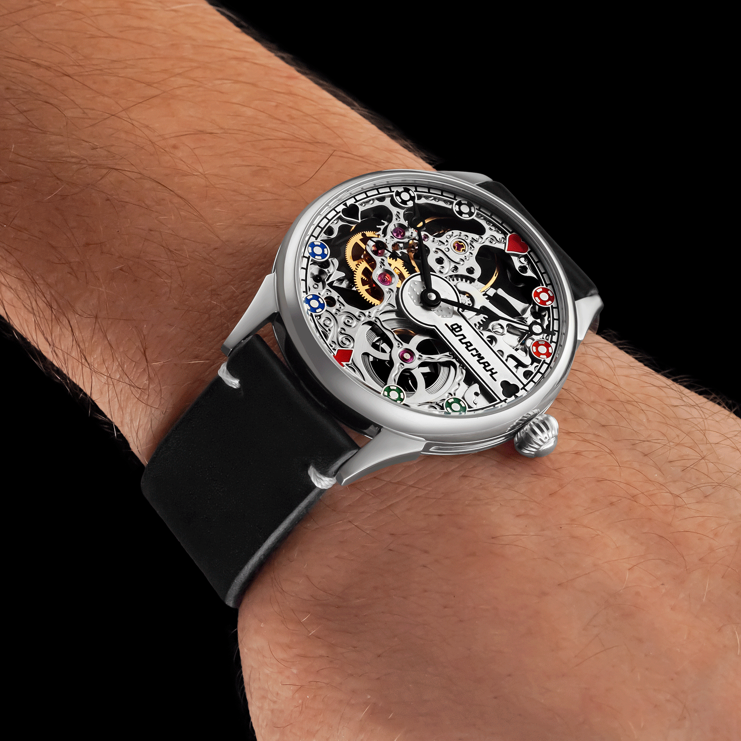 Front view of handmade skeleton watch worn on wrist – poker-inspired design