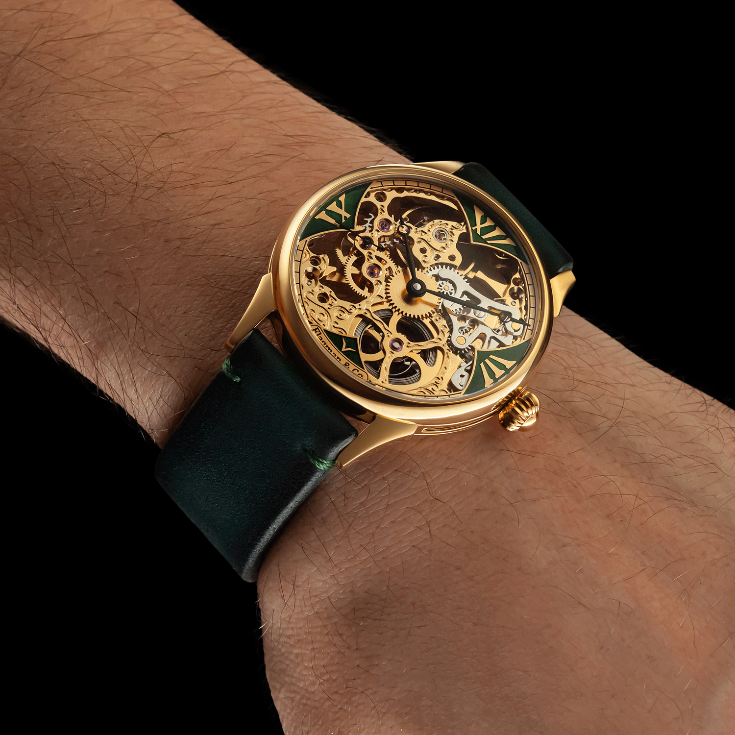 Skeleton wristwatch with green strap on a wrist against a black background