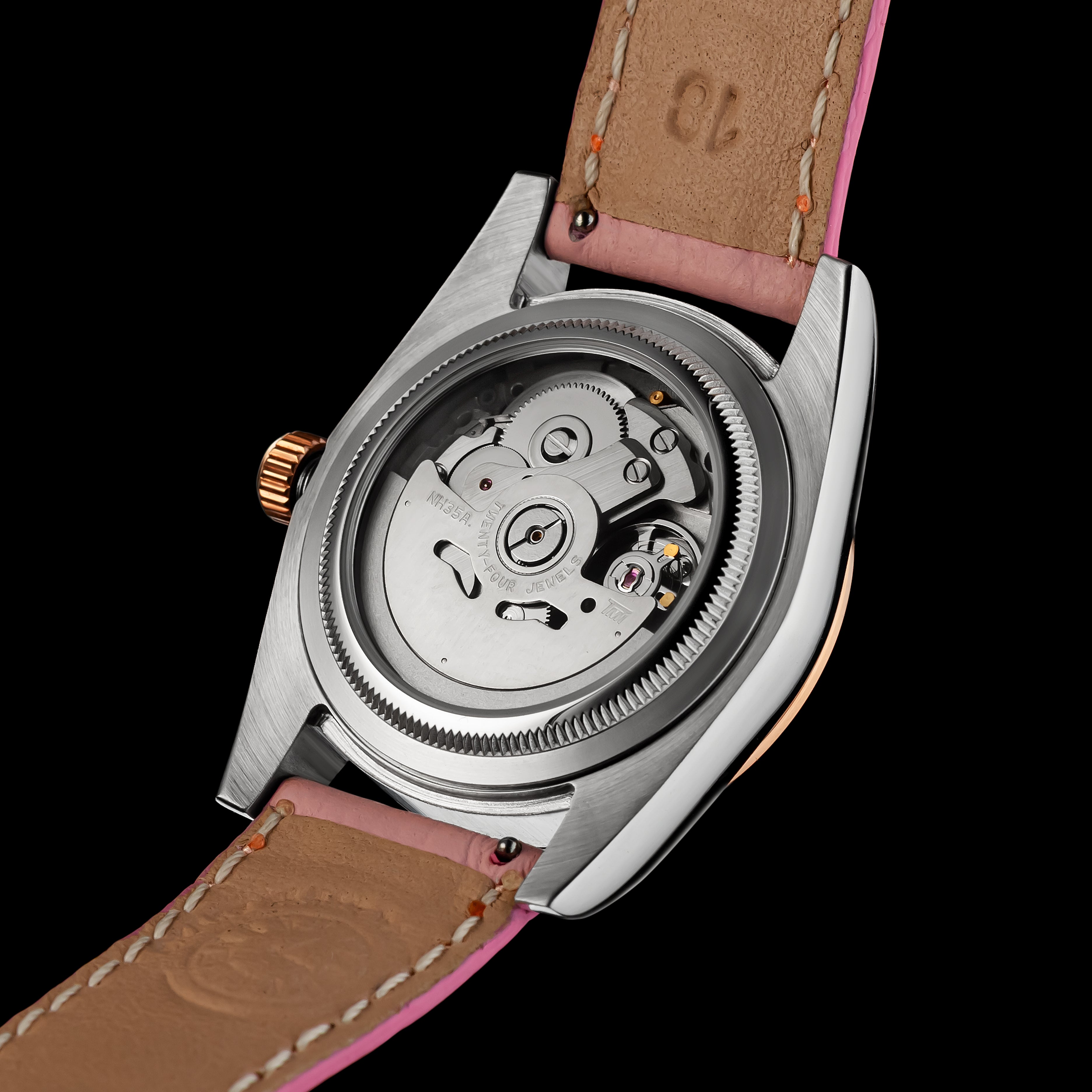 Watch with brown leather strap and visible mechanical components on a black background