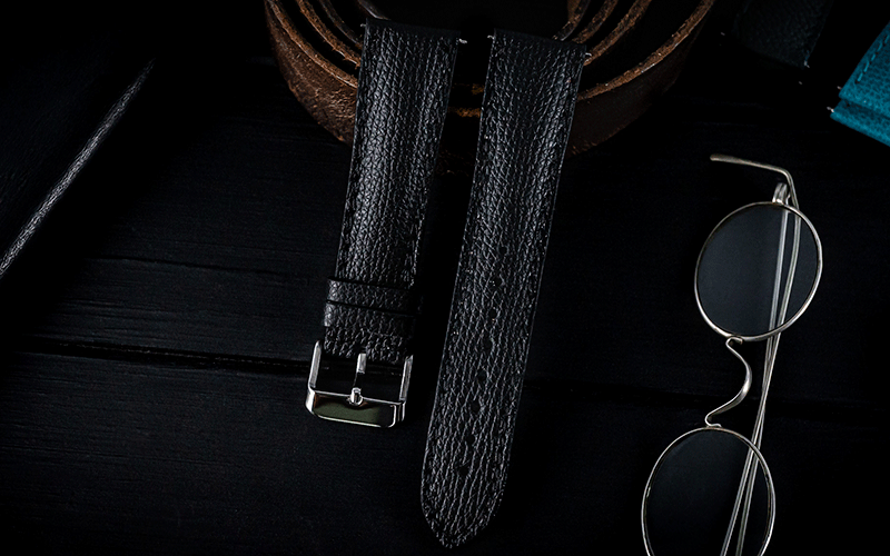 Banner image for the watch straps category, featuring leather and metal bands